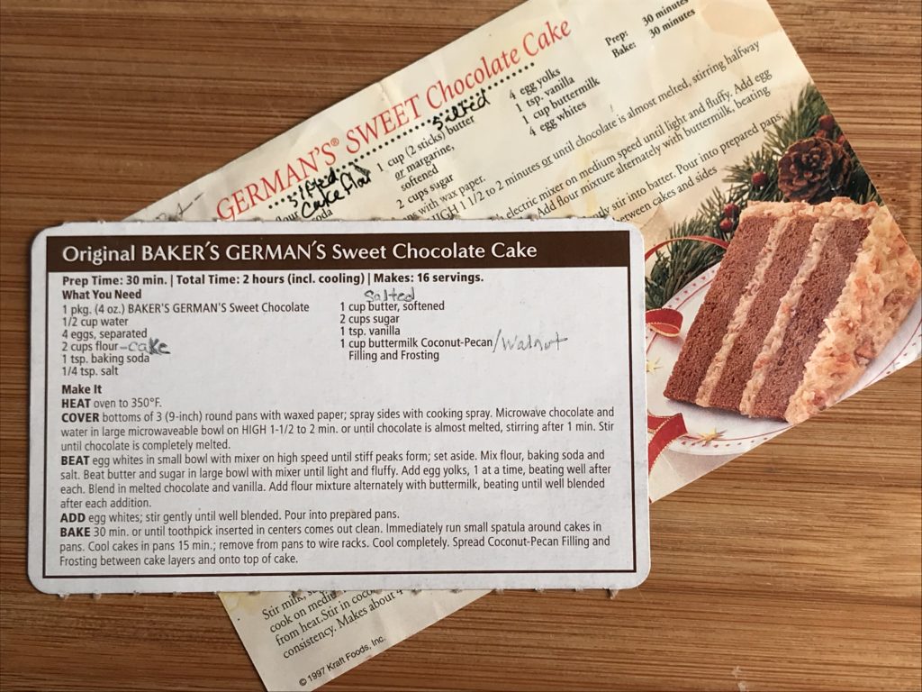 How to read a recipe using the recipe card for Original Baker's German's Chocolate cake arranged on top of another recipe card. The bottom recipe card has a picture of a slice of German Chocolate cake.