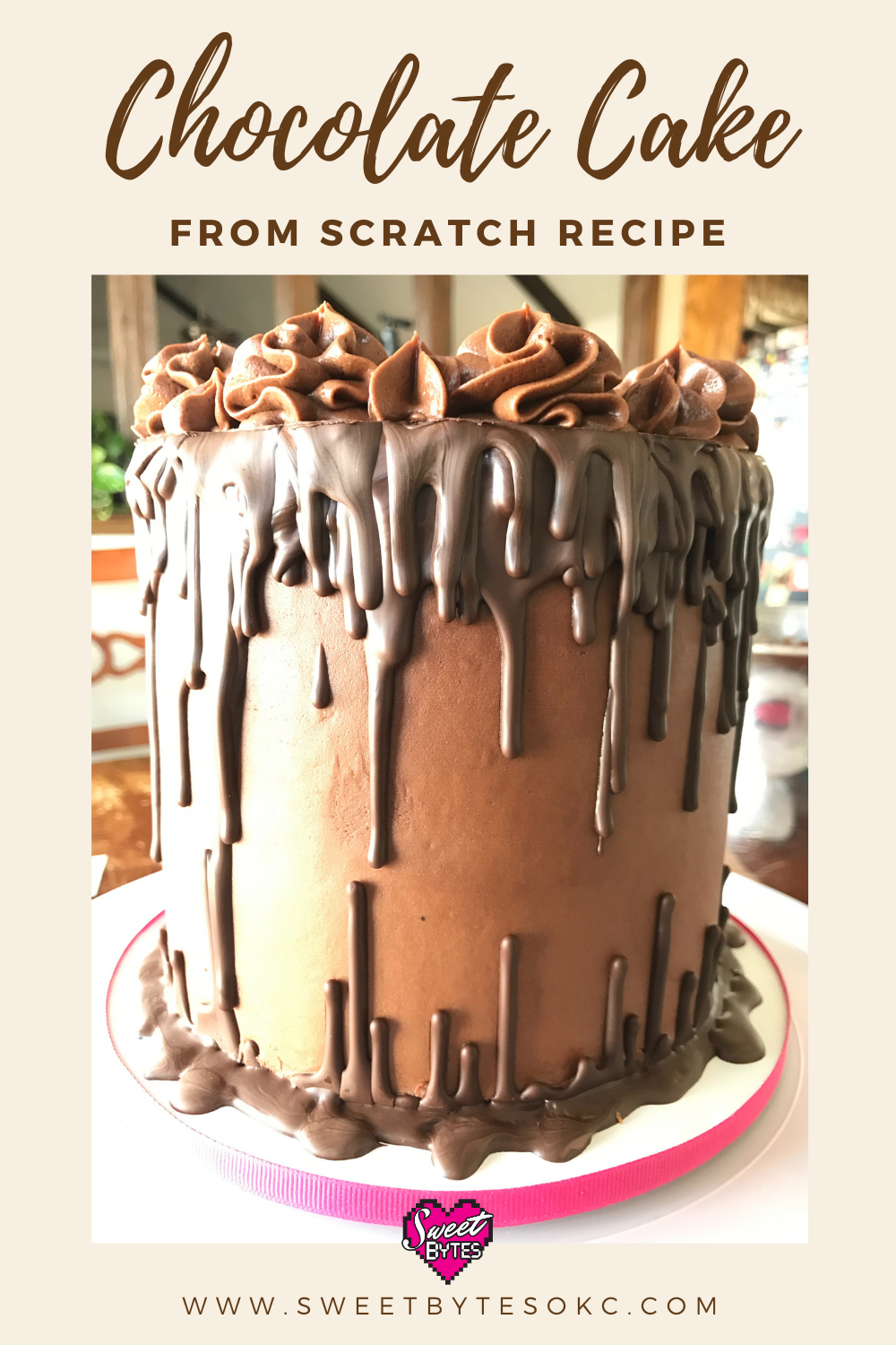 tall Chocolate cake made from scratch with smooth chocolate buttercream and drippy chocolate ganache