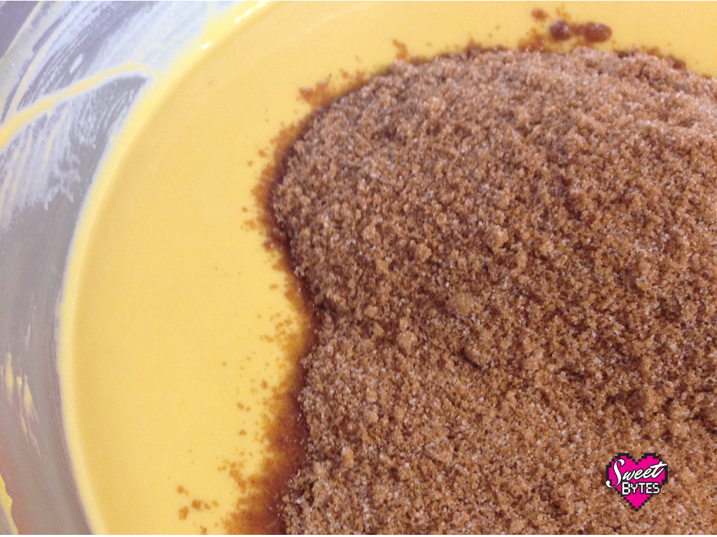 Close up of pumpkin mixture with sugar mixture poured on top to make pumpkin pie filling