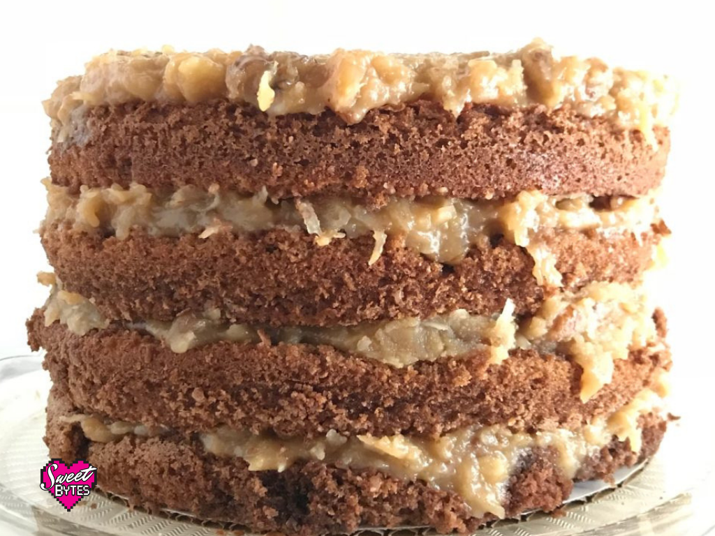 Cake stuck in pan but survived. 4 layer german chocolate cake with naked sides. 