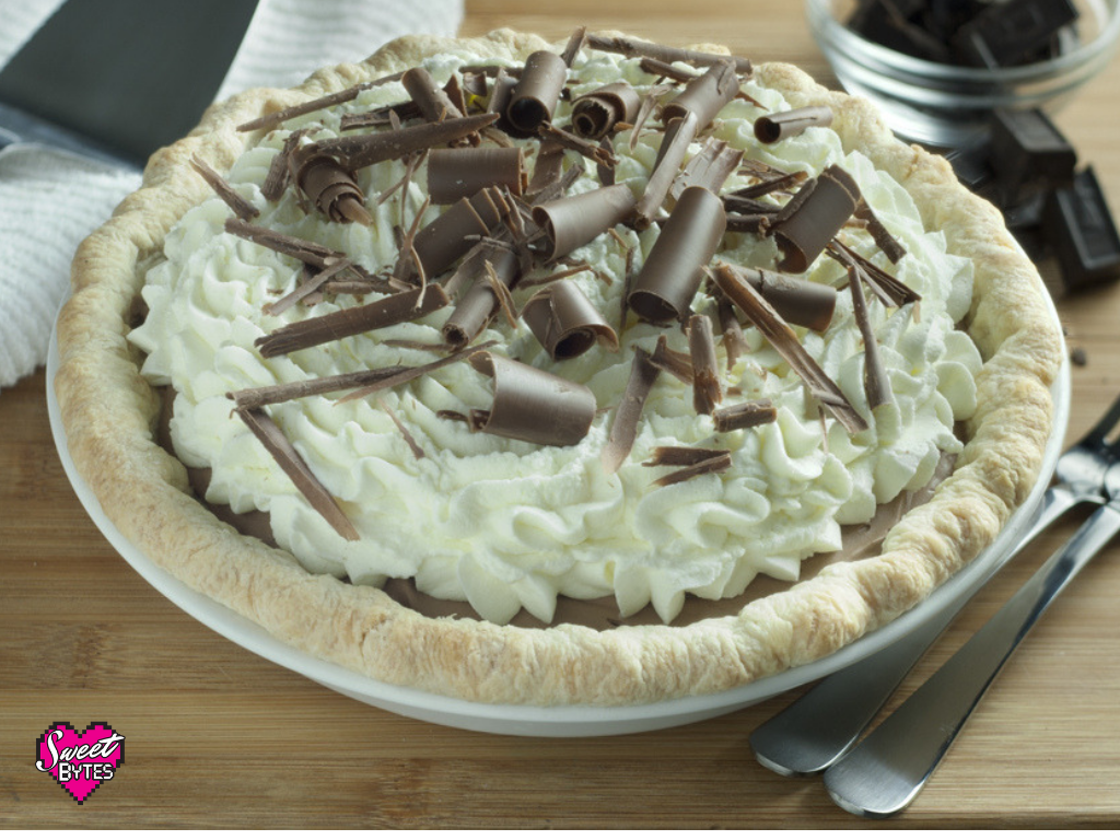 French Silk Pie with whipped cream and chocolate curls