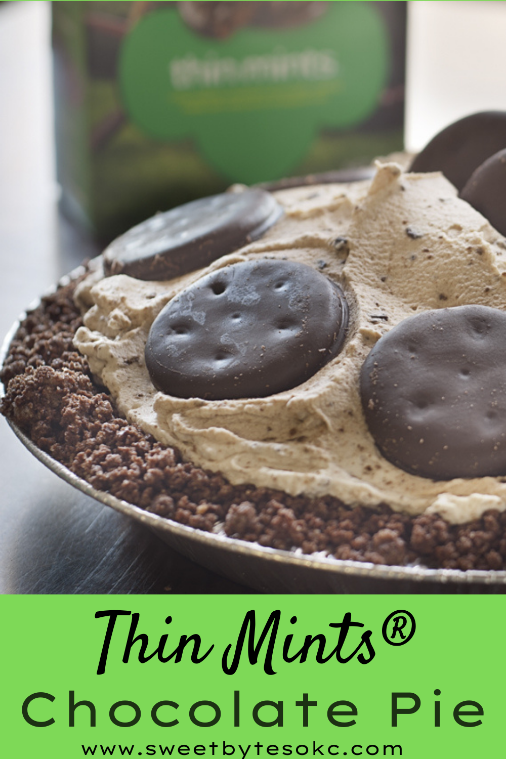 a chocolate pie made with thin mints girl scout cookies and a box of thin mints girl scout cookies in the background