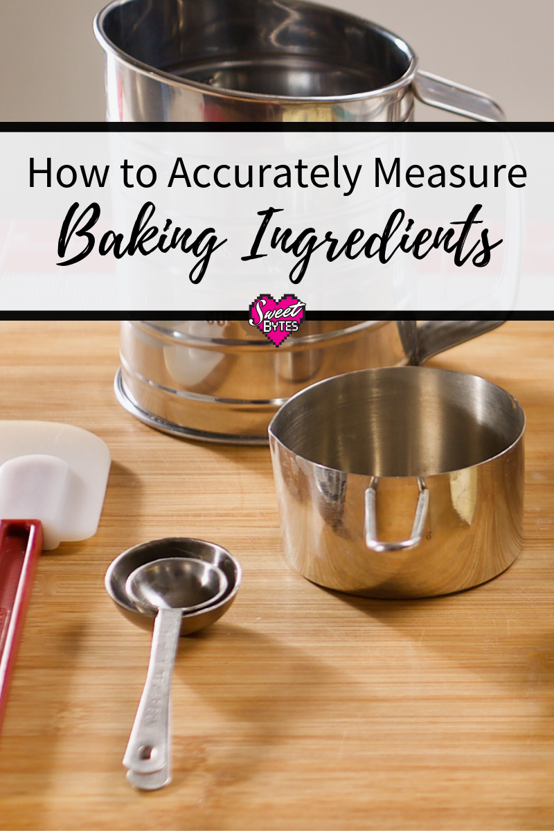 silicone spatula, measuring spoons, and a stainless steel measuring cup on a cutting board with a graphic banner for Pinterest