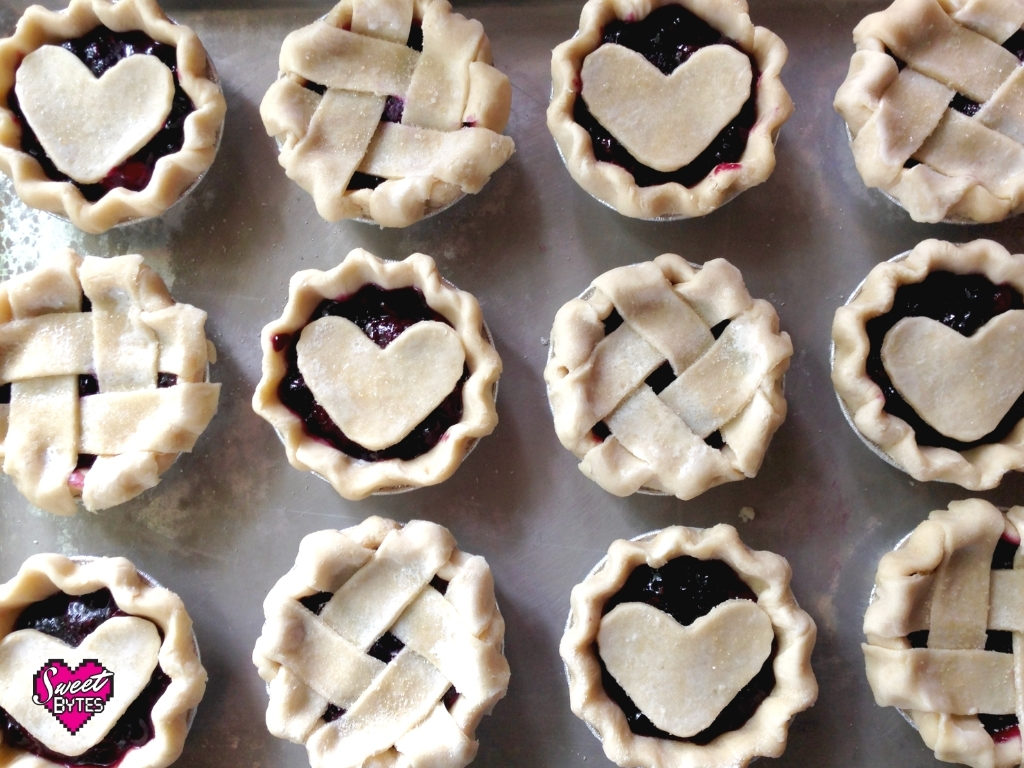 12 mini pies with alternating hearts and lattice using the best pie crust recipe