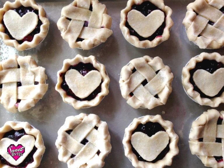 12 mini pies with alternating hearts and lattice using the best pie crust recipe