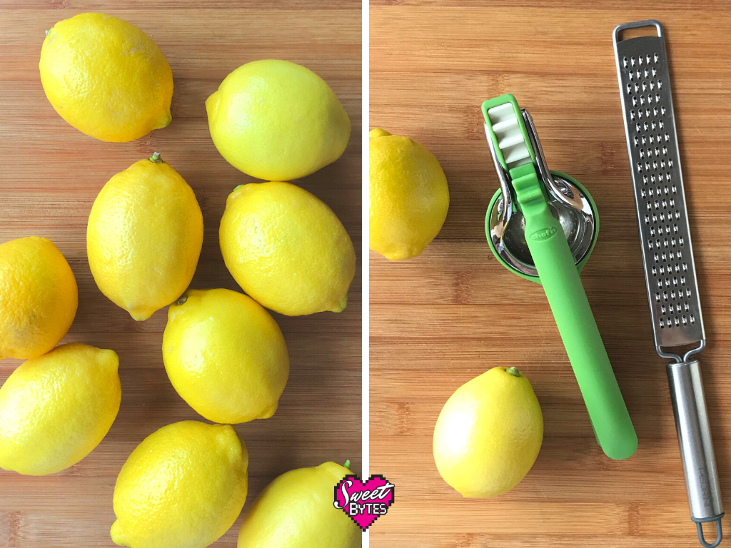 Fresh lemons on a cutting board, a citrus juicer, and a microplane zester used to make the lemon meringue pie recipe