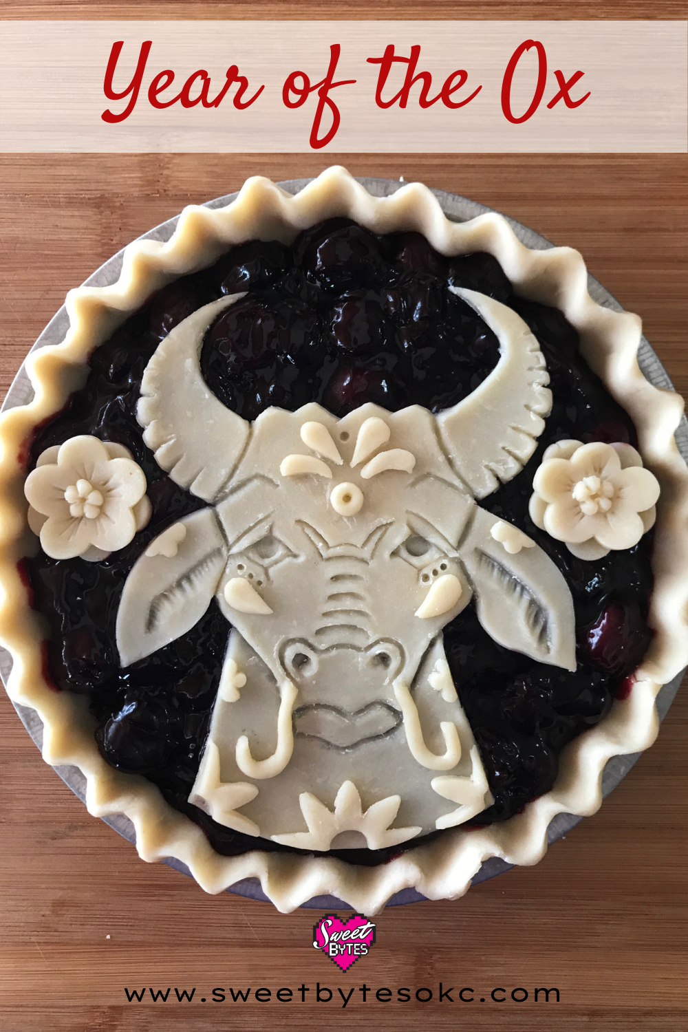 Hand Sculpted Ox made out of pie crust decorating a cherry pie for Lunar New Year